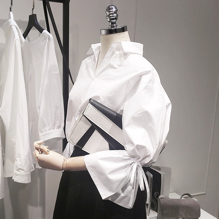 Áo kiểu tay phồng cổ chữ V thiết kế thanh lịch cho phái nữ | BigBuy360 - bigbuy360.vn