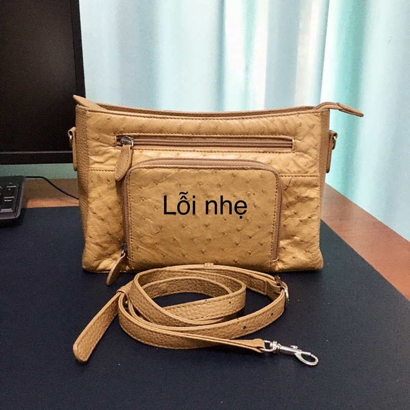 Túi đeo chéo da lạ