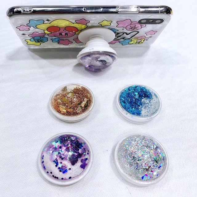 Giá đỡ điện thoại có kim tuyến lấp lánh bên trong xinh xắn