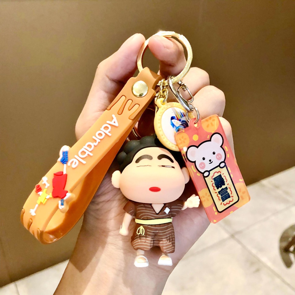 Móc Khóa Xe Hơi Hình Cậu Bé Bút Chì Dễ Thương
