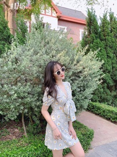 Đầm hoa cúc cột nơ GG