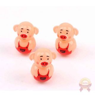 Lật đật hình heo chặn giấy
