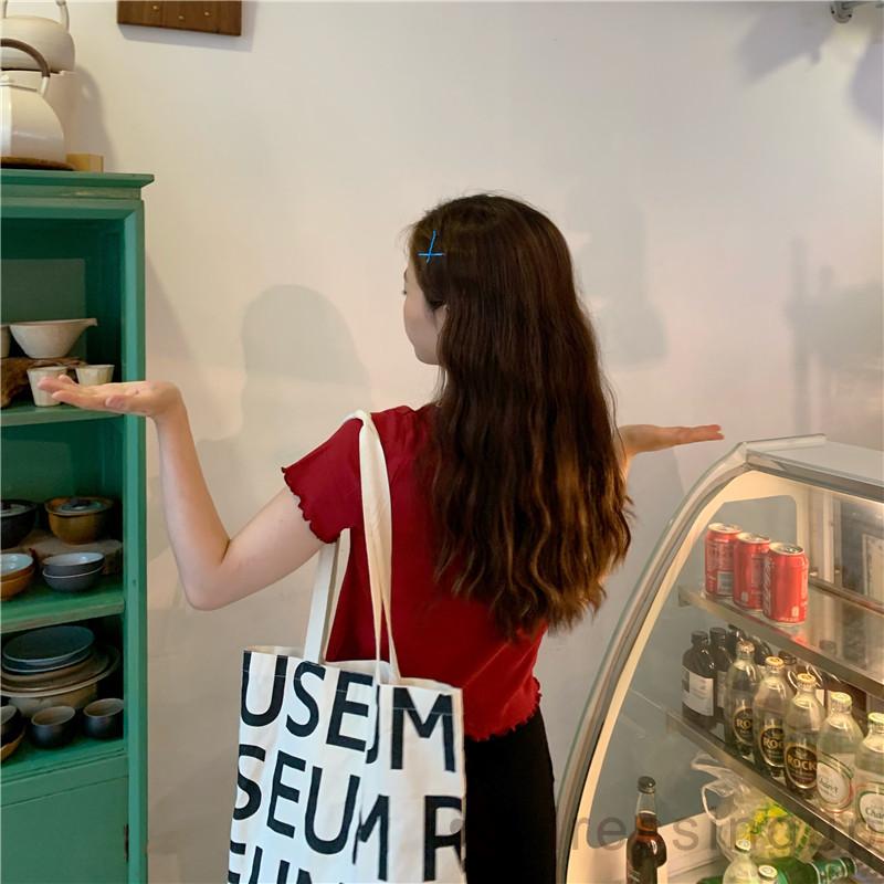 Áo Thun Nữ Tay Ngắn Cổ Tròn Họa Tiết Thêu Đơn Giản | BigBuy360 - bigbuy360.vn