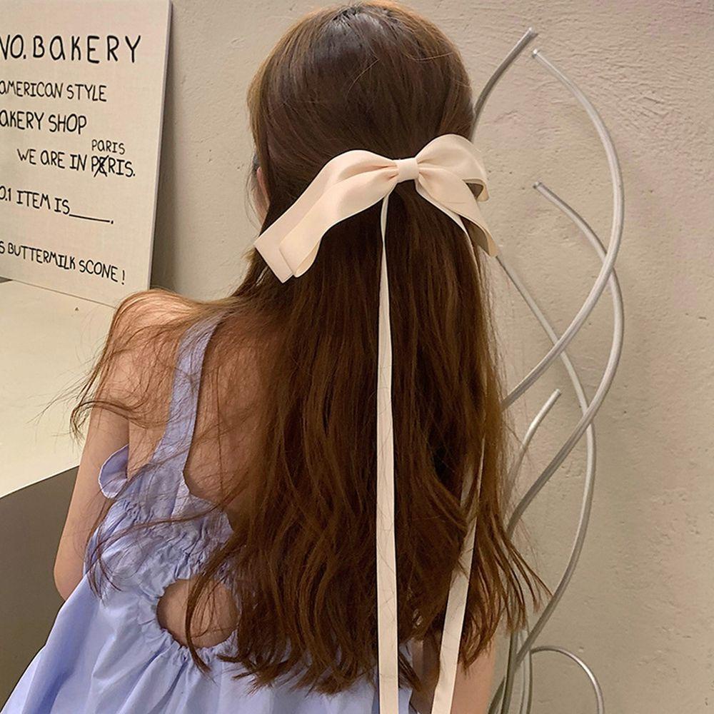 Kẹp Tóc Nơ Ruy Băng Màu Tím Dễ Thương Cho Nữ