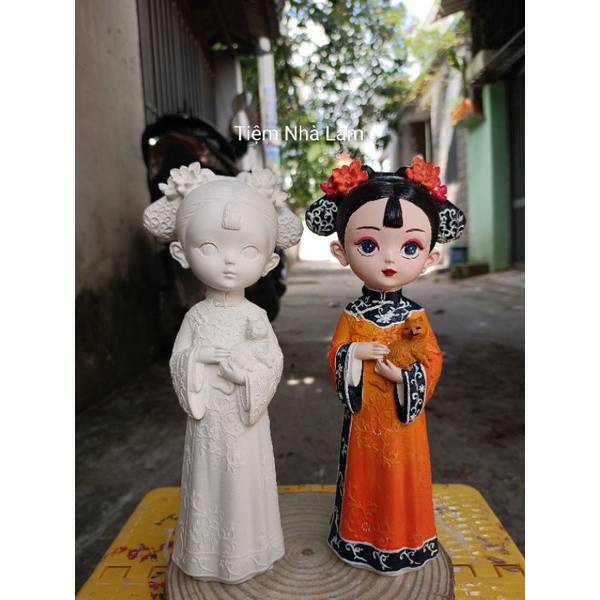 Tượng tô màu cô gái ôm mèo