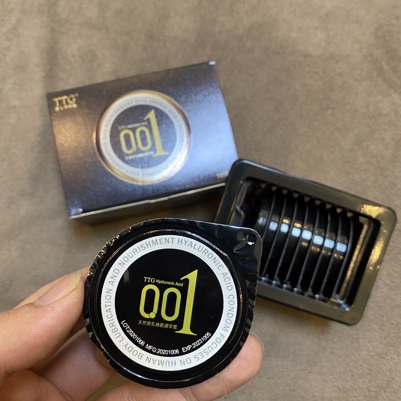 Bao Cao Su TTG 0.01mm Màu Đen Siêu Mỏng- Ôm sát Nhiều gel OLO - Hộp 10 bcs tặng 1 storm