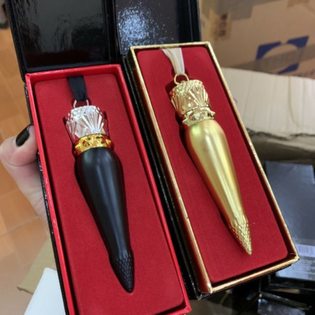 SON CHRISTIAN LOUBOUTIN