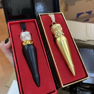 SON CHRISTIAN LOUBOUTIN