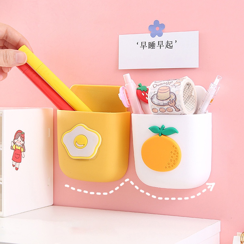 Ống để remote có lỗ sạc điện thoại dán tường độc đáo