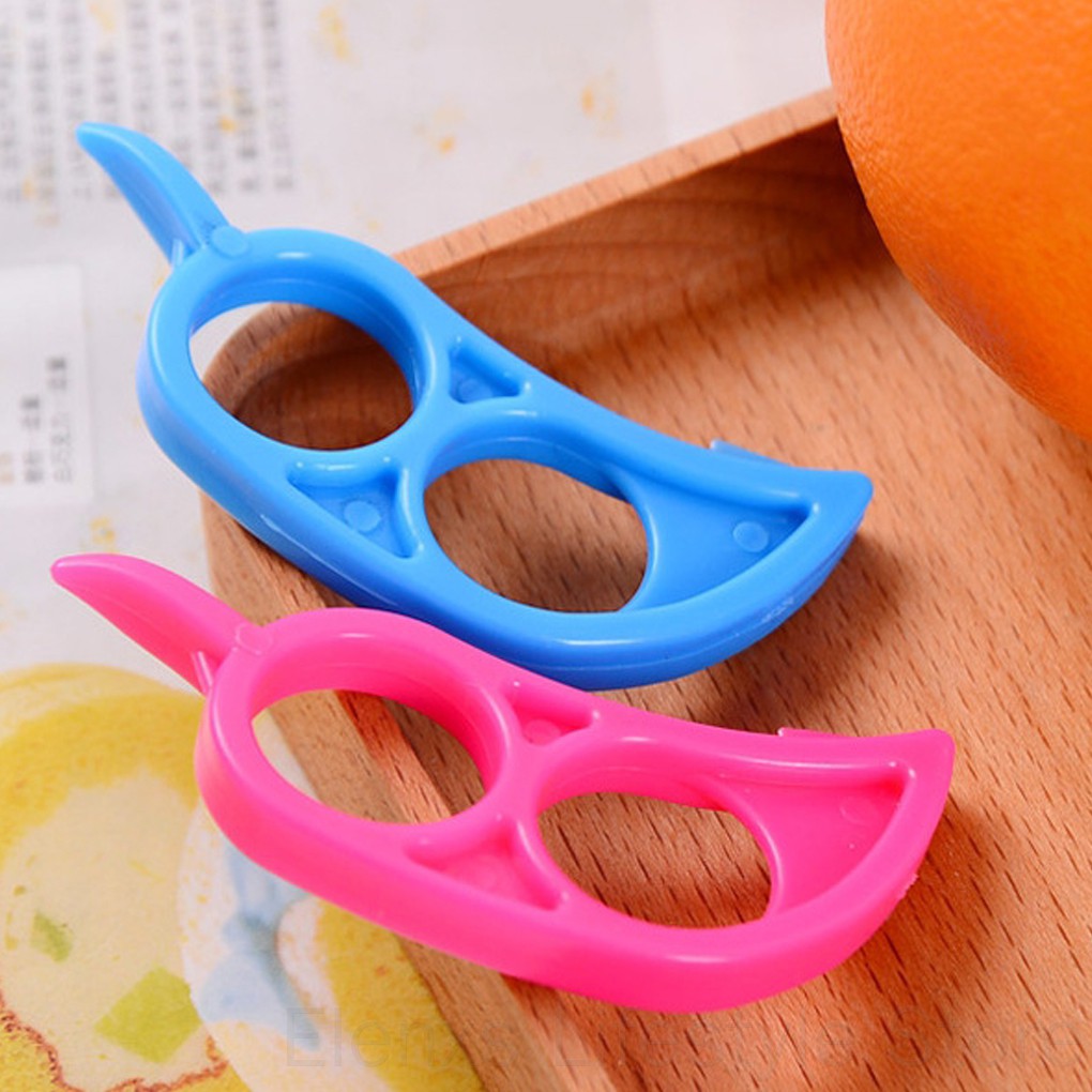 Dụng cụ xỏ ngón tay lột vỏ cam bằng nhựa