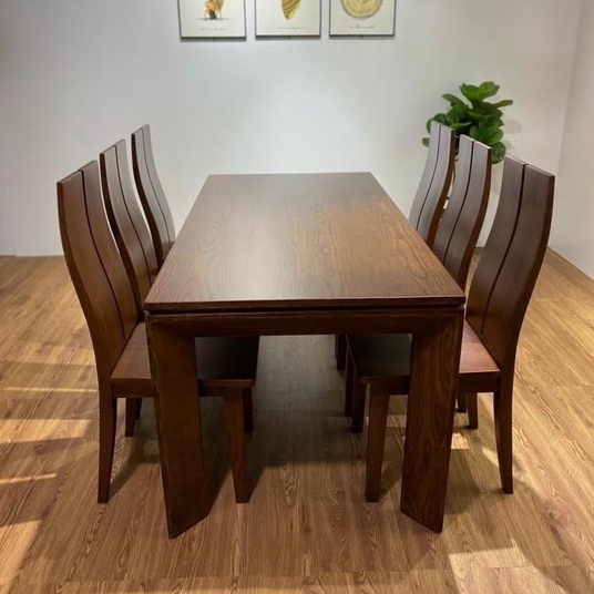 Bàn ăn mặt gỗ chân vát