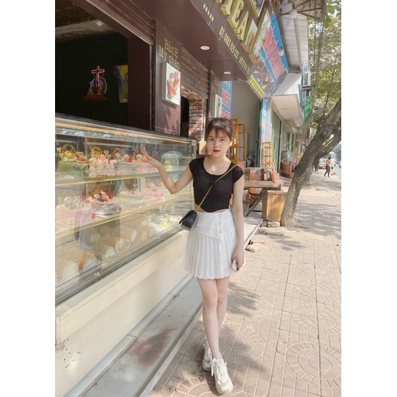 CHÂN VÁY XẾP LY NẮP TÚI ĐÍNH KHUY NG Ọ C