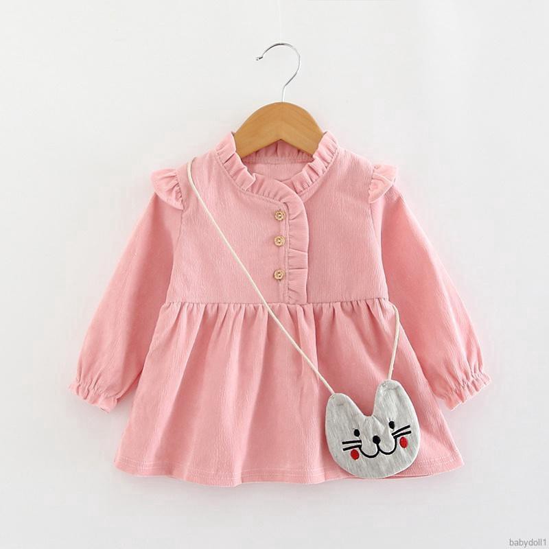 Đầm thun dài tay màu trơn kèm túi đeo chéo thời trang cho bé