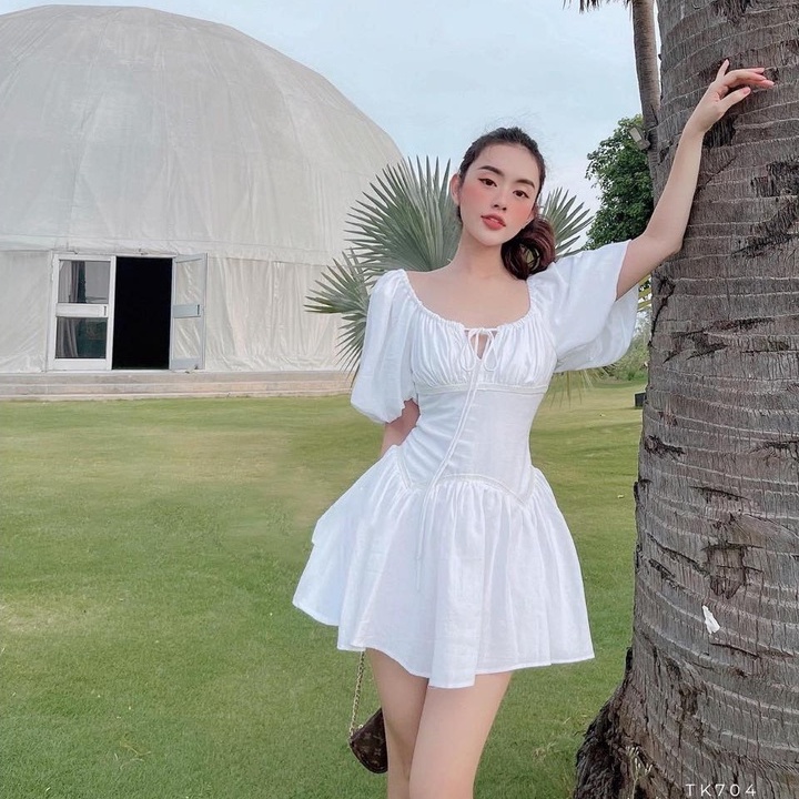 Đầm xòe nhún ngực rút dây đuôi cá tay phồng