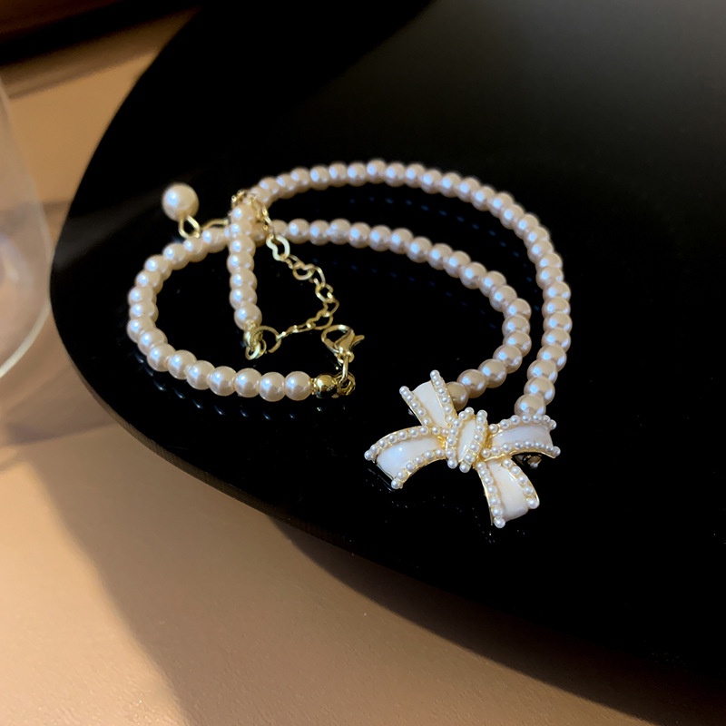 Bộ Vòng cổ + Bông Tai Hình Nơ Đính Ngọc Trai Nhân Tạo Thời Trang Hàn Quốc