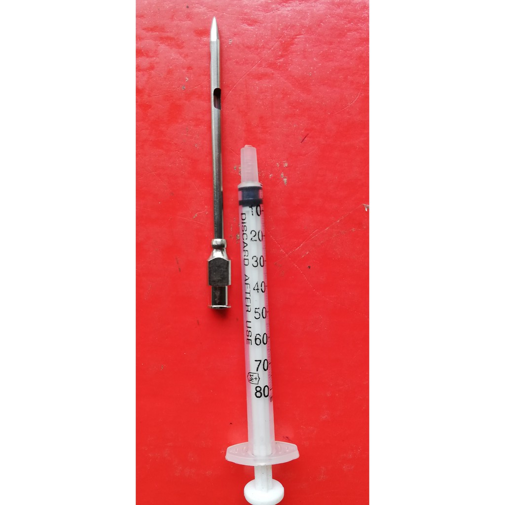 Bơm kim tiêm dùng để bơm hóa chất trị sâu đục thân trên cây trồng và vật nuôi chó mèo