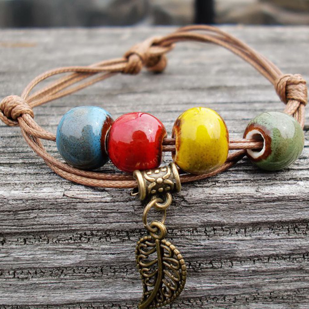 Vòng tay dây da 4 hạt sứ nhiều màu | BigBuy360 - bigbuy360.vn