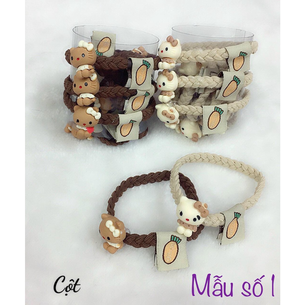 2 dây cột tóc dạng đan thắt gam màu trà sữa đính icon gấu, kitty, thỏ tím Stella Lou