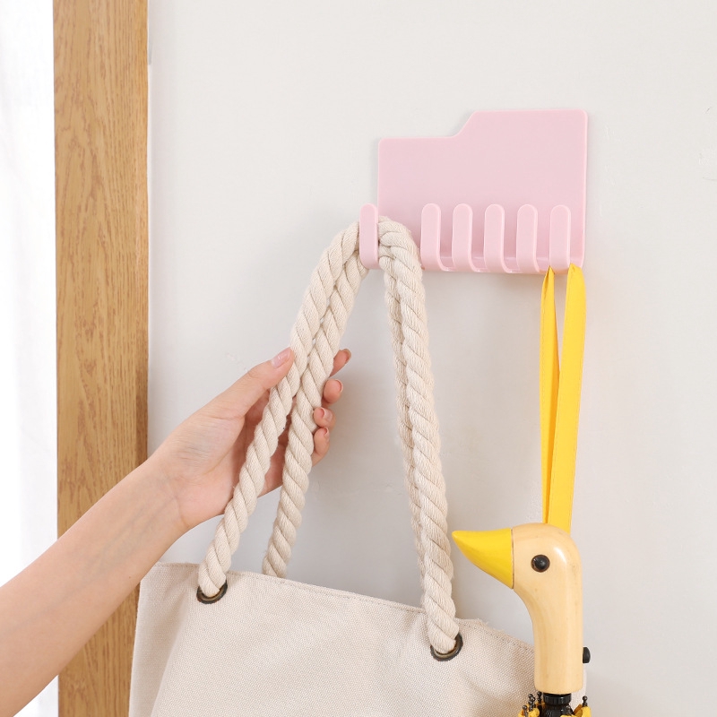 Handy wall mounted toothbrush/toothpaste/razor holder