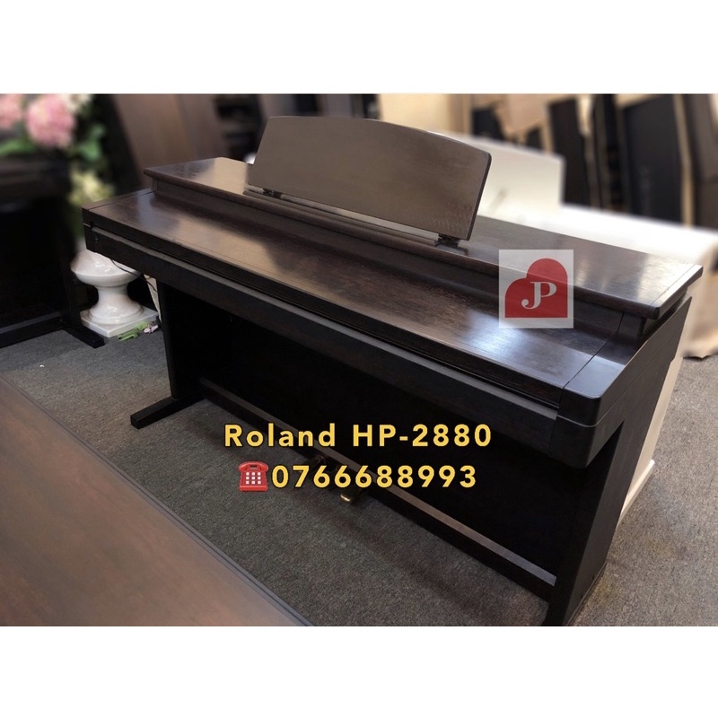 Đàn Piano Roland HP-2880 màu nâu đen kiểu dáng cực đẹp