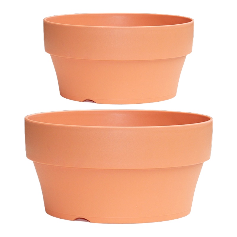 Chậu đất nung nhân tạo làm từ nhựa có lỗ thoát nước hỗ trợ trồng cây tiện lợi