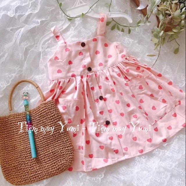 Đầm dây trái tim cho bé