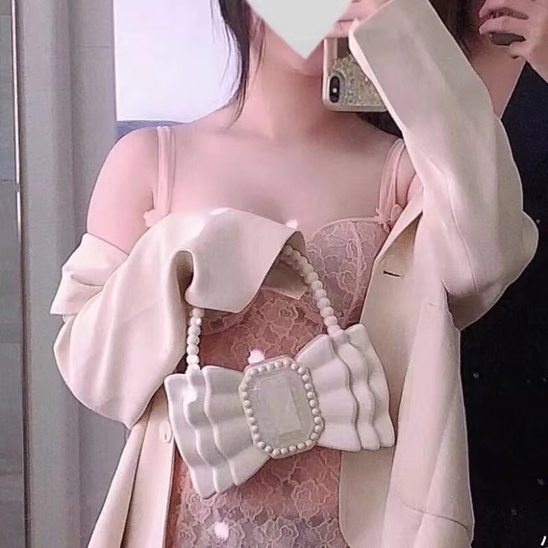 Túi xách nữ hình nơ sáng chảnh lạ mắt