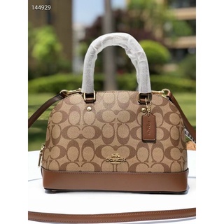 Túi Coach hến da thật pha pu canvas