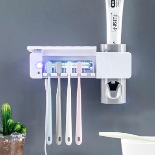 Máy lấy kem đánh răng tự động có kèm đèn diệt khuẩn bàn chải bằng tia UV