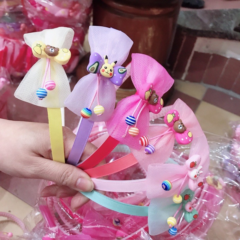 Sỉ 10 cài tóc nơ ren gắn các hoạ tiết hình thú xinh xắn cho các bé