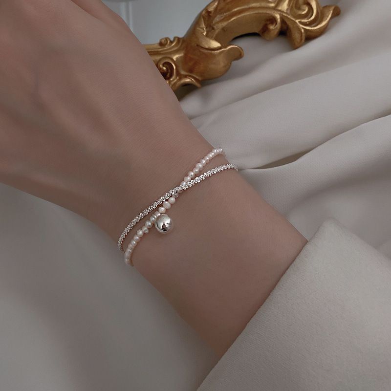 Vòng tay bạc nữ S925 - Lắc tay nữ bạc Ý 2 lớp hạt trai nhân tạo chuông nhỏ Aring sang trọng Zaza accessories