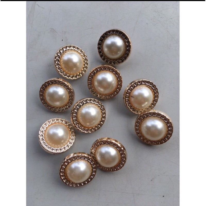 Set 20 nút sử dụng đơm kết trên áo váy