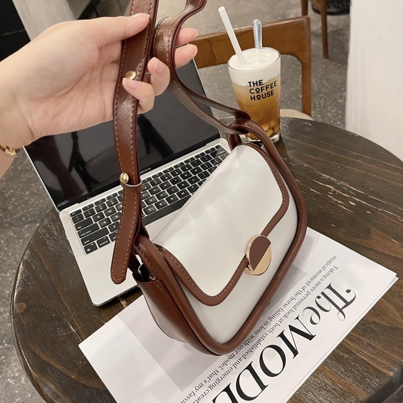 TÚI ĐEO VINTAGER VIỀN NÂU KHOÁ TRÒN