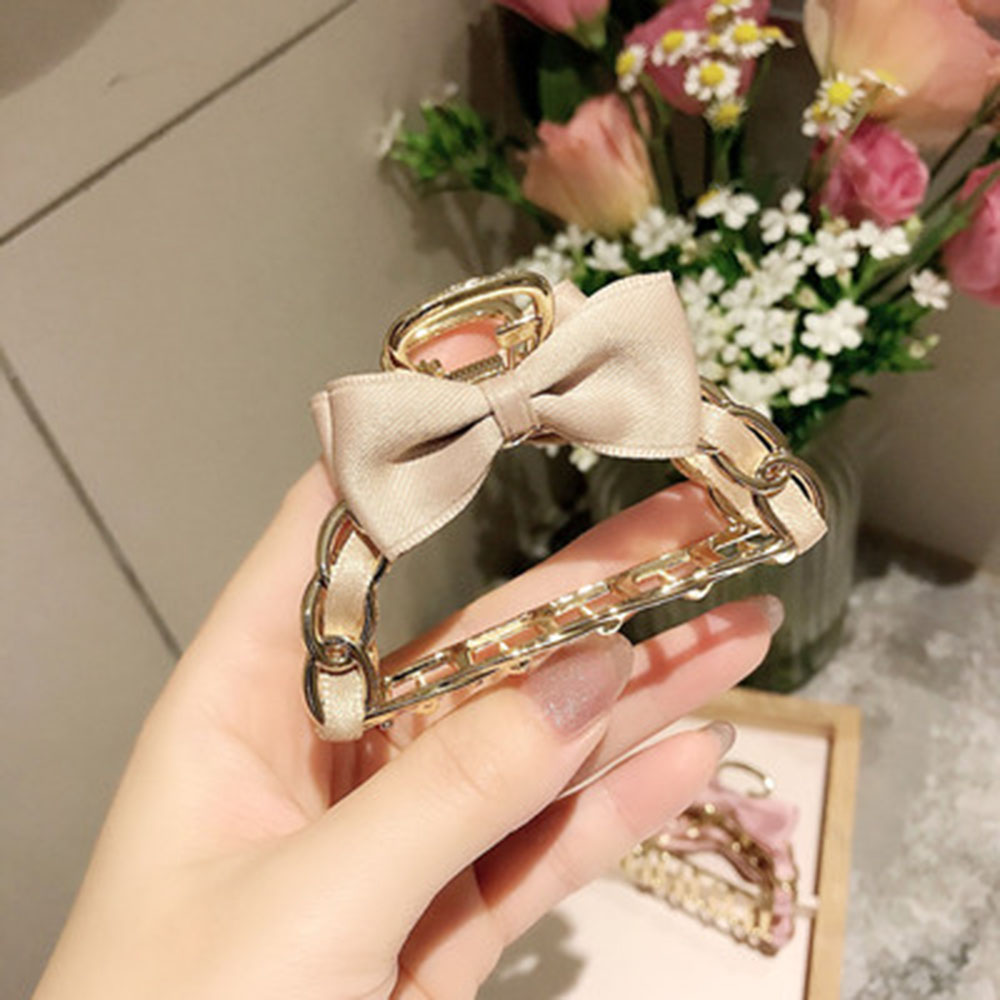 Kẹp tóc đính nơ thời trang nữ dễ thương