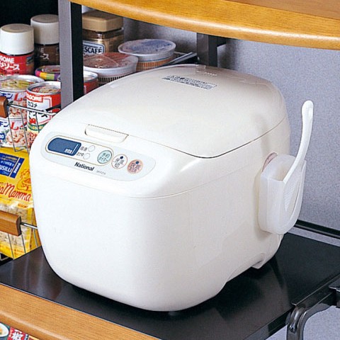 Muôi xới cơm kèm giá đựng