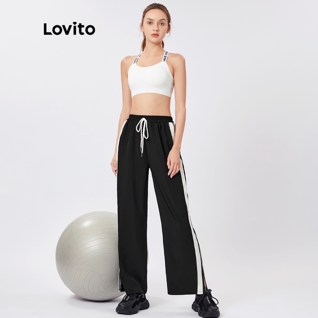 Quần Lovito màu trơn xẻ gấu phối viền tương phản phong cách thể thao L26AD073 (màu đen)