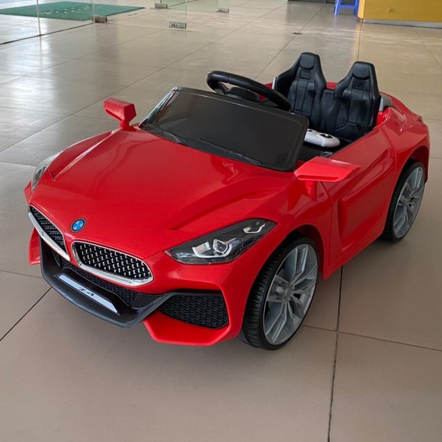 Ô tô xe điện trẻ em BMW Z4 tự lái và remote cho bé vận bảo hành 6 tháng (Đỏ-Trắng-Cam)