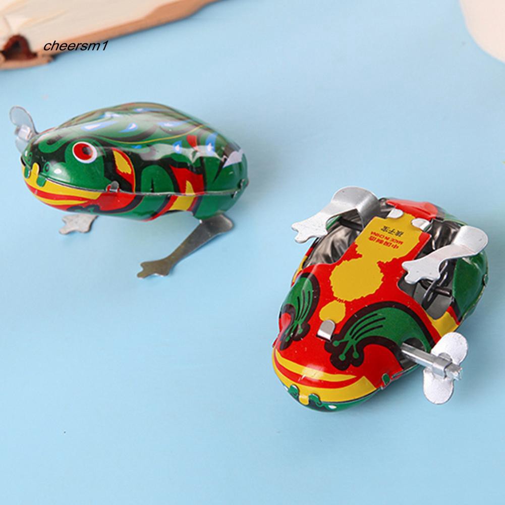 Đồ chơi con ếch nhảy lên dây cót cho bé trai