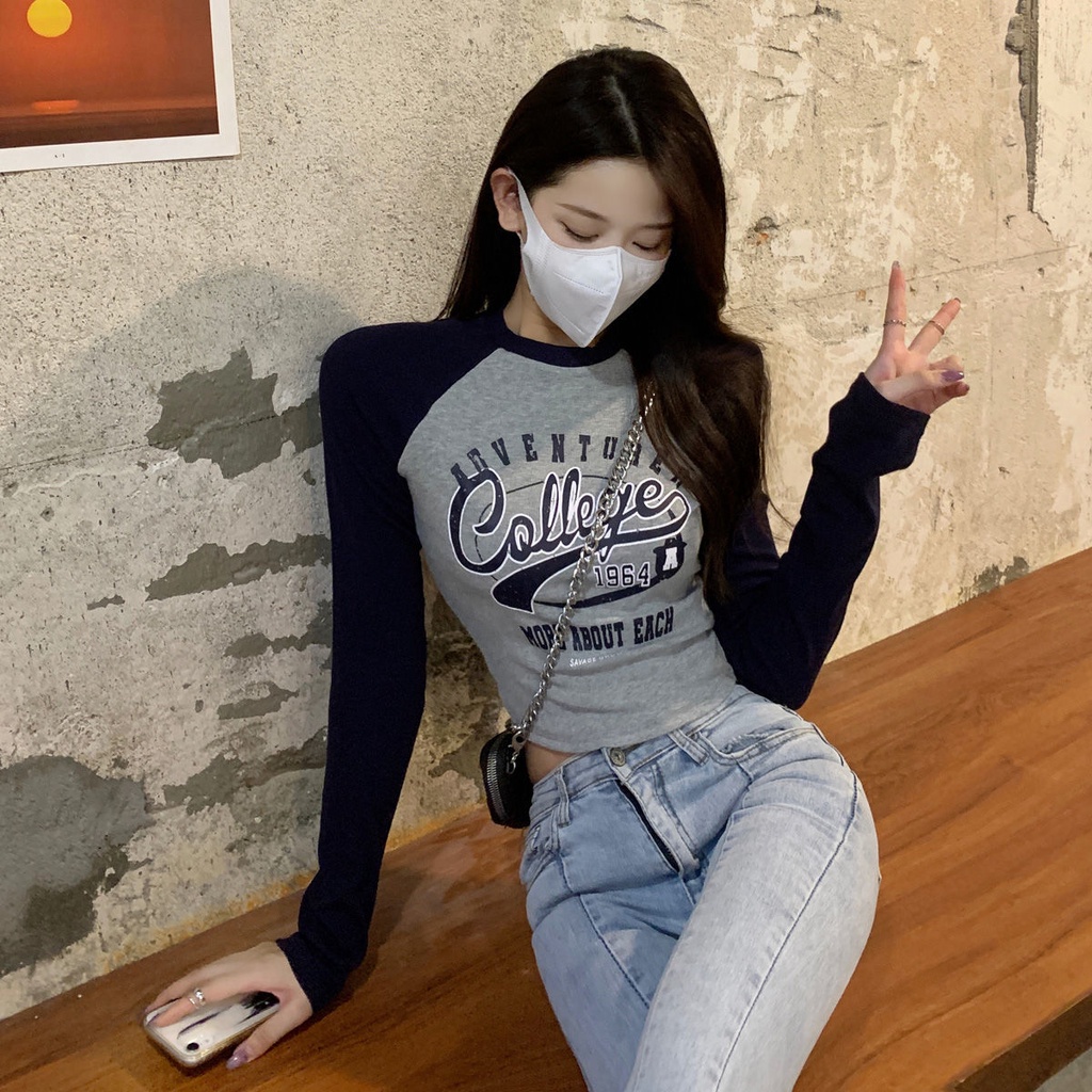 Áo thun tay dài in họa tiết màu sắc tương phản đầy phong cách cho nữ