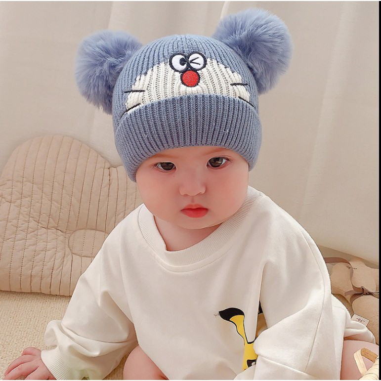 Mũ nón len Mèo Doremon đội mùa đông cho bé trai bé gái dưới 1 tuổi có Hai Quả Bông hình Mèo Doremon 2020