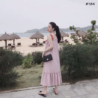 Đầm caro hồng nơ ngực