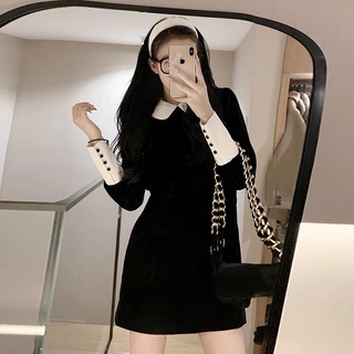 Váy nhung đen cổ bèo