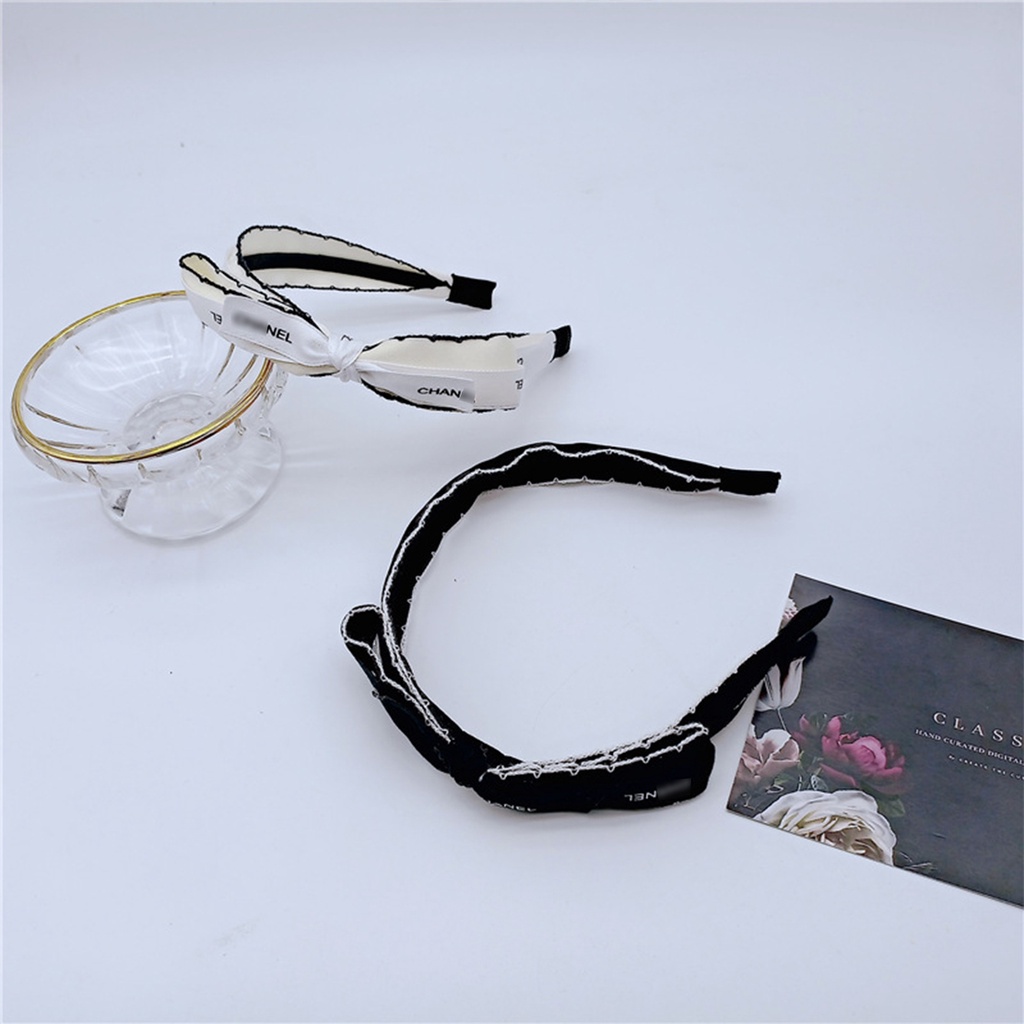Băng đô bờm cài tóc nơ lệch vải lụa satin viền ren 2 màu đen trắng xinh xắn Hàn Quốc, June accessories