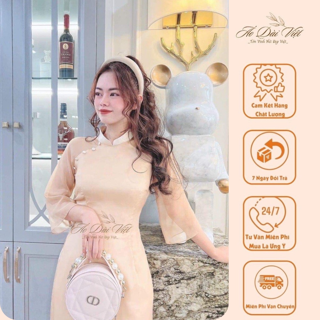 Áo Dài Cách Tân Voan Tơ Màu Nút Độc Lạ Với Thiết Kế Trơn Đính Cúc Mang Lại Phong Cách Nhẹ Nhàng Trẻ Trung