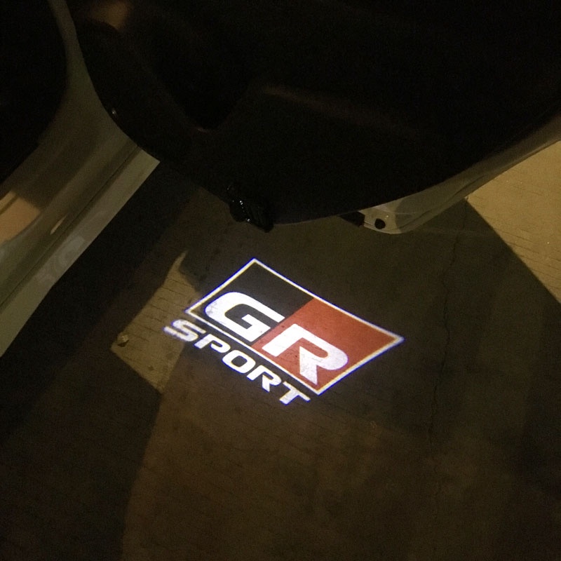 2 Đèn LED Chiếu Sáng Cửa Xe Hơi Cho Toyota GR VIos Yaris Corolla Cross Wish Revo CHR Avanza Fortuner Rush Wigo Innova