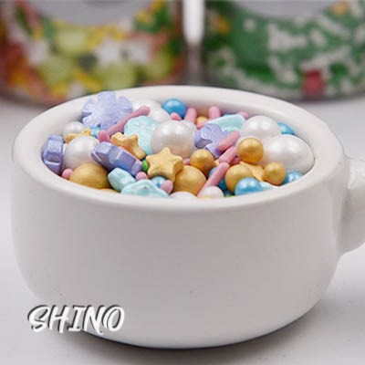 Sprinkle mix tím vàng trắng xanh hộp 85 gam