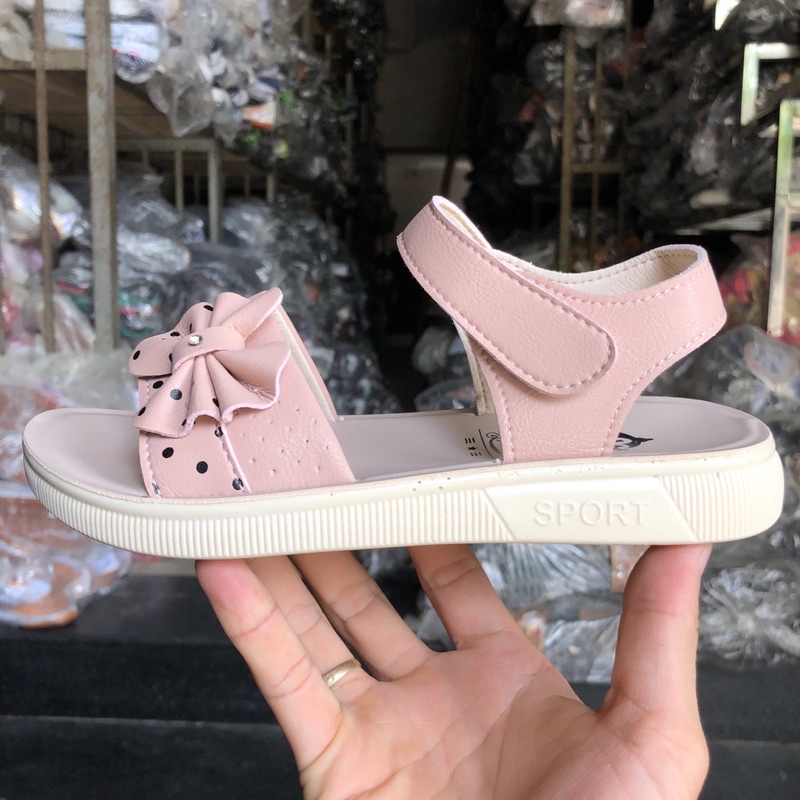 Dép trẻ em sandal bé gái hình nơ chấm bi bản ngang , quai hậu học sinh da đế cao su nhẹ xpa giá rẻ