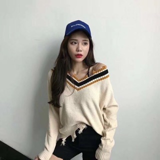 Áo len cổ tim