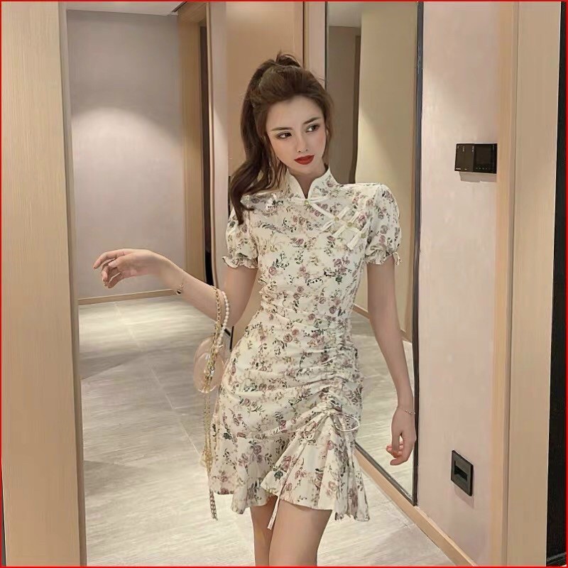 Đầm cổ tàu rút dây hông hoạ tiết hoa nhí mặc tết