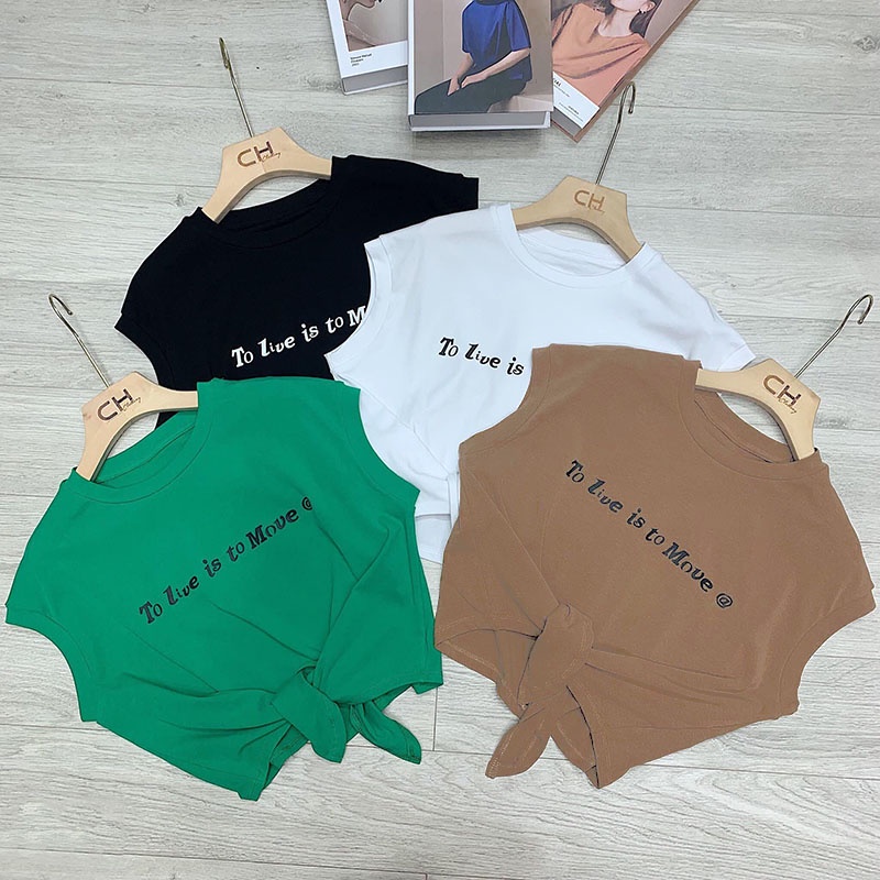 Áo Crop-top buộc vạt in chữ "To live is to move @"